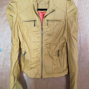 It has been sitting in my closet.I am now size L